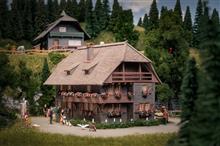 1/87 JUBILÄUMSMODELL UHRENMACHERHAUS MIT FIGUR